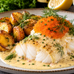 Torskrygg med champagnesås, rostad potatis och löjrom